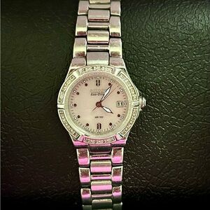 Citizen Women's Silver Watch with Pink Mother of Pearl Face.